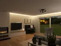 Gemütliches Wohnzimmer mit Kamin, Klavier und Sofa. Die Wände sind in der Farbe beige gestrichen, was für eine warme Atmosphäre sorgt.