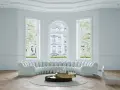 Ein helles Wohnzimmer mit geschwungener Couch, modernem Beistelltisch und einem futuristischen Sessel. Helle Wandfarben schaffen eine luftige Atmosphäre.