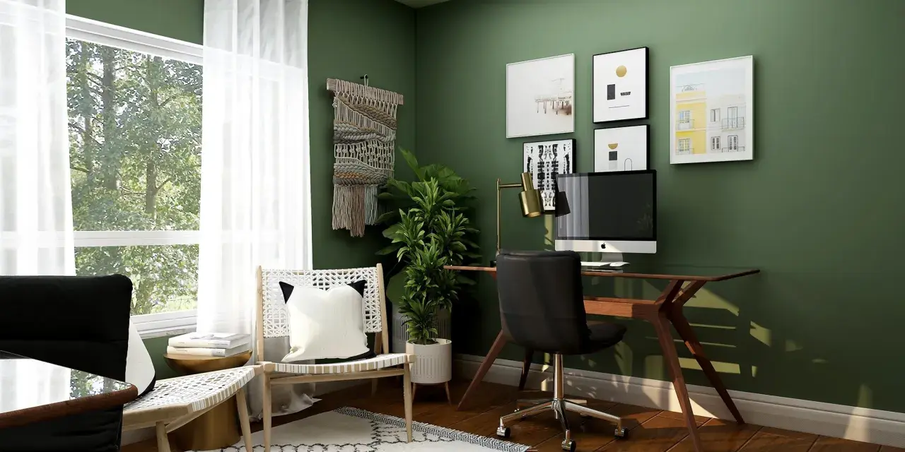 Grünes Arbeitszimmer mit Schreibtisch, bequemen Stühlen und Fenster. Tolle Inspirationen für dein Arbeitszimmer einrichten.
