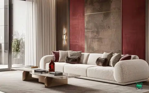 Luxuriöses Wohnzimmer mit einem cremefarbenen Sofa, das mit Kissen in verschiedenen Texturen und der Akzentfarbe bordeaux dekoriert ist. Die Wand hinter dem Sofa ist in einem tiefen Rotton gehalten.