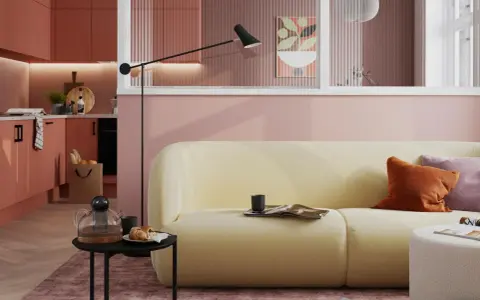 Ein hellgelbes Sofa mit orangefarbenen und lila Kissen vor einer rosafarbenen Wand. Die Frage, welche Farbe passt zu rosa, wird hier stilvoll beantwortet.