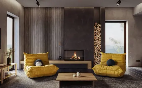 Gemütliches Wohnzimmer mit gelben Sesseln und Kamin. Die **Farben und ihre Wirkung** sind hier harmonisch auf die Einrichtung abgestimmt.