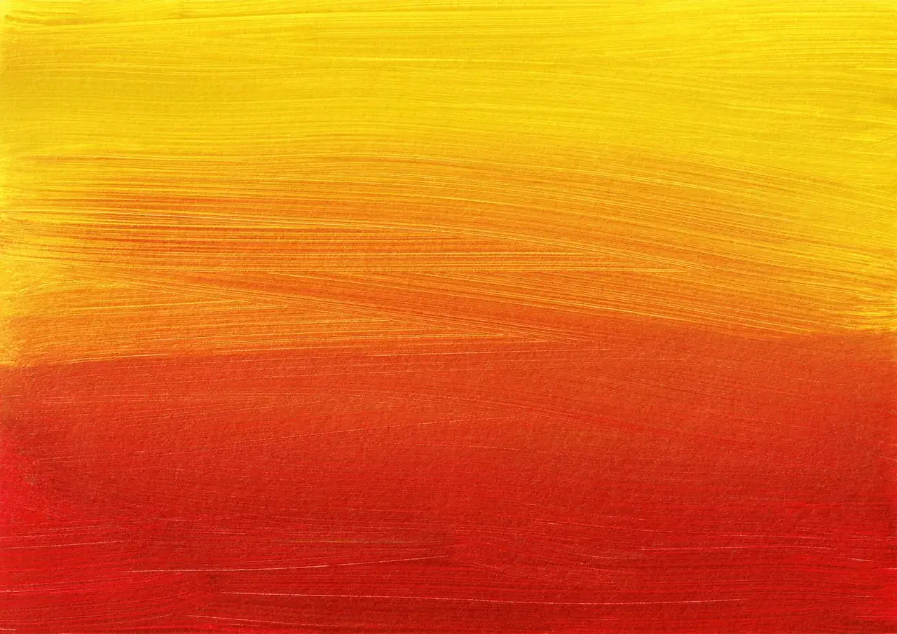 Farbverlauf von Gelb über Orange bis Rot. Die Pinselstriche sind deutlich sichtbar und erzeugen eine warme, lebendige Textur. Ein schönes Beispiel, wie man Farben mischen kann.